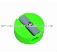 green round plastic pencil sharpener